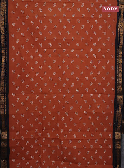 Sungudi cotton saree rust shade and black with allover batik prints and zari woven border