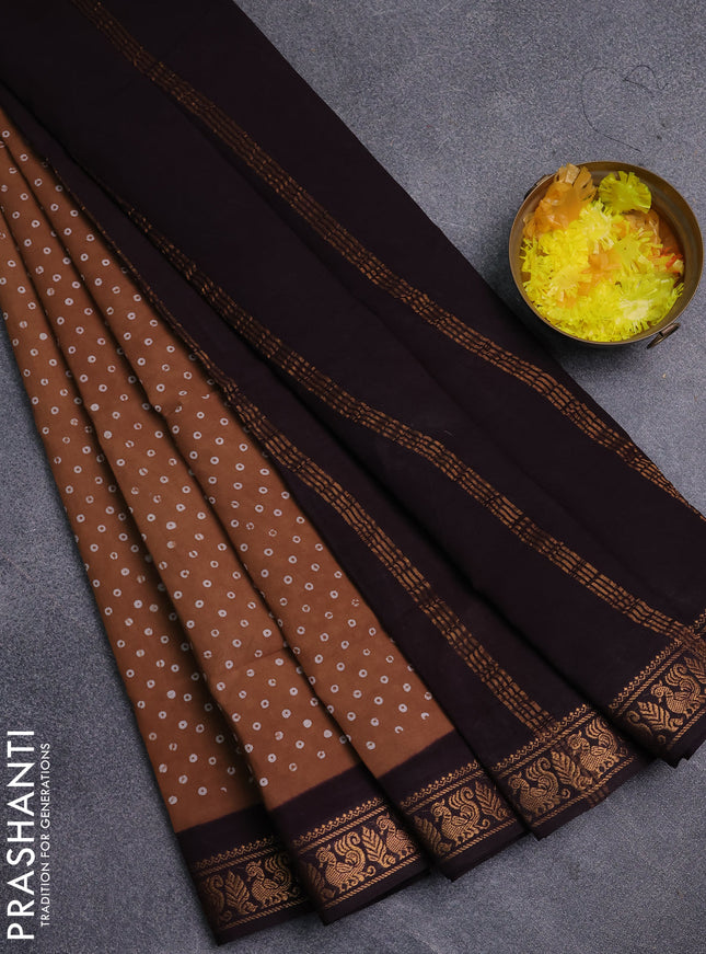 Sungudi cotton saree dark sandal and deep wine shade with allover batik prints and zari woven border
