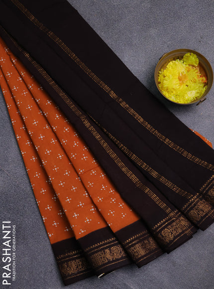 Sungudi cotton saree mustard yellow and coffee brown with allover batik prints and zari woven border
