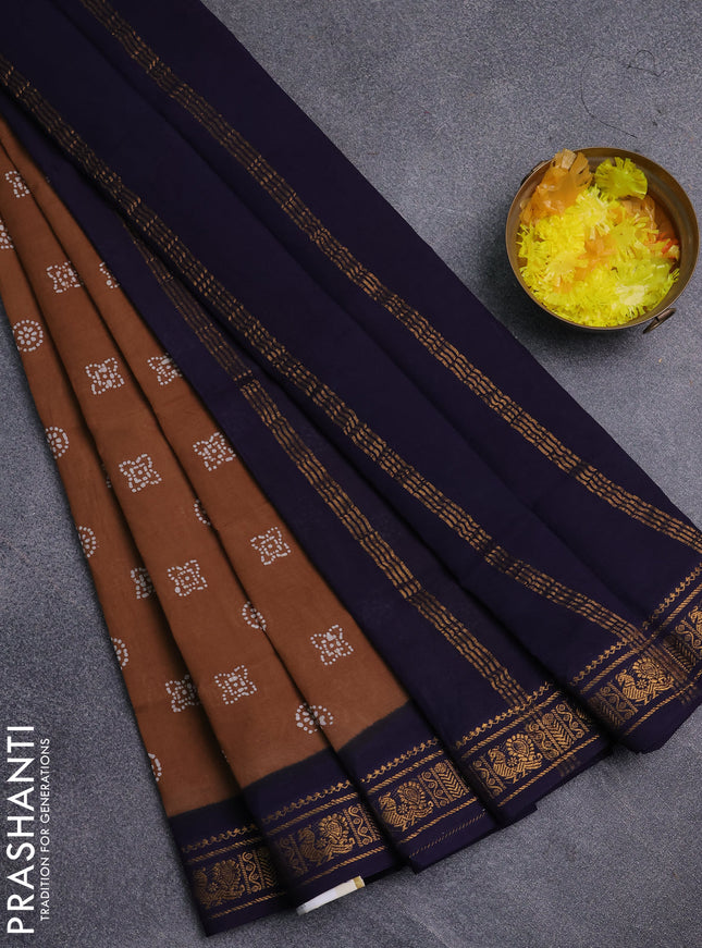 Sungudi cotton saree dark sandal and navy blue with allover batik prints and zari woven border