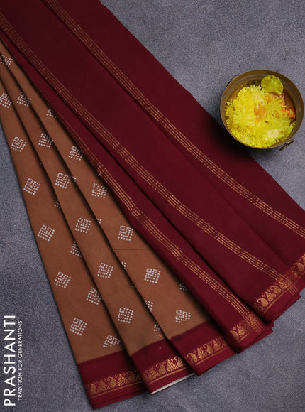 Sungudi cotton saree dark sandal and deep maroon with allover batik prints and zari woven border