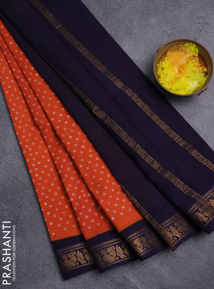 Sungudi cotton saree orange and navy blue with allover batik prints and zari woven border
