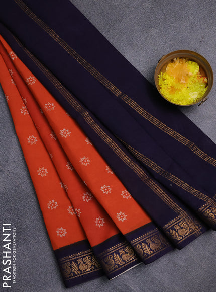 Sungudi cotton saree orange and navy blue with allover batik prints and zari woven border