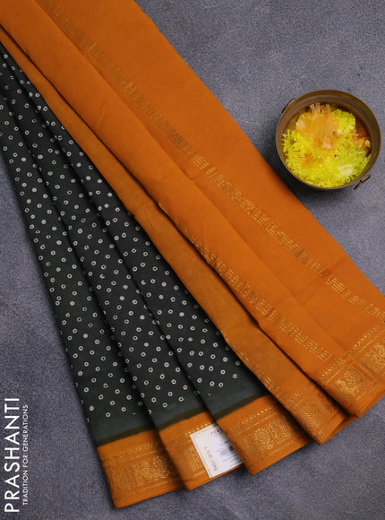 Sungudi cotton saree bottle green and mustard yellow with allover batik prints and zari woven border