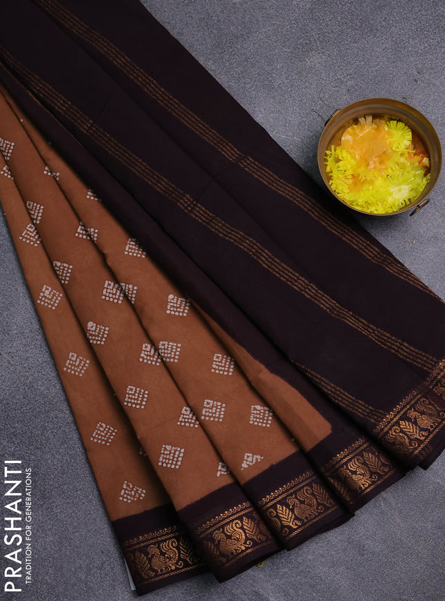 Sungudi cotton saree dark sandal and wine shade with allover batik prints and zari woven border