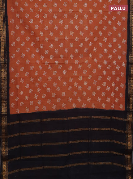 Sungudi cotton saree rust shade and black with allover batik prints and zari woven border