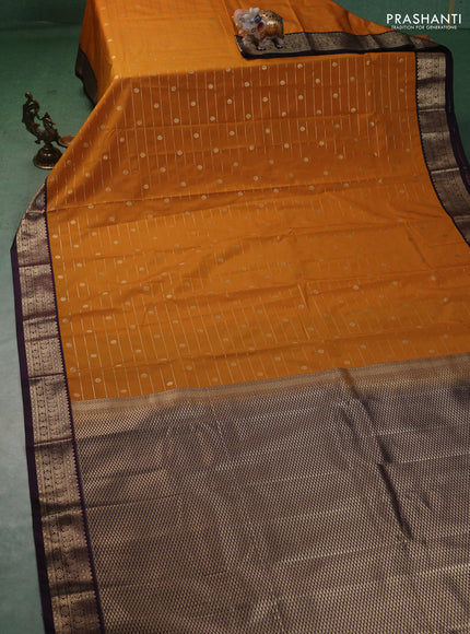 Semi kanchipuram silk saree mango yellow and purple with allover zari weaves & buttas and zari woven korvai border