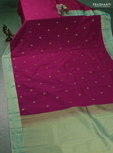 Semi kanchipuram silk saree pink and teal green shade with zari woven buttas and zari woven korvai border