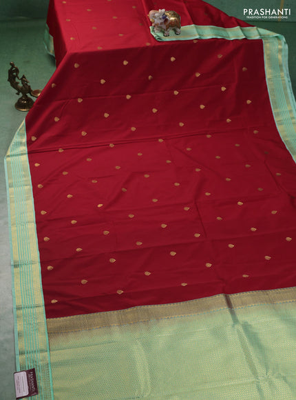 Semi kanchipuram silk saree red and teal green shade with zari woven buttas and zari woven korvai border