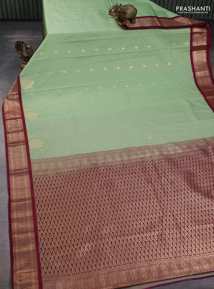 Semi kanchipuram silk saree pastel green and maroon with allover zari weaves & buttas and zari woven korvai border