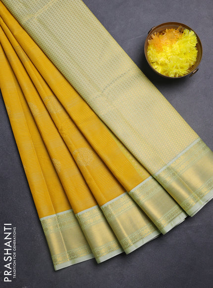 Semi kanchipuram silk saree yellow and pista green with allover zari weaves & buttas and zari woven korvai border