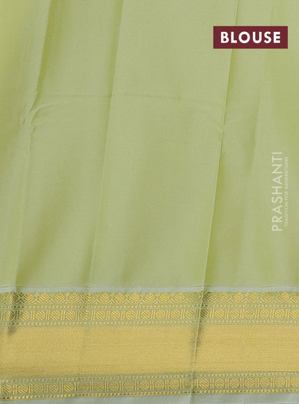 Semi kanchipuram silk saree yellow and pista green with allover zari weaves & buttas and zari woven korvai border