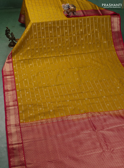 Semi kanchipuram silk saree mango yellow and pink with allover zari weaves & buttas and zari woven korvai border