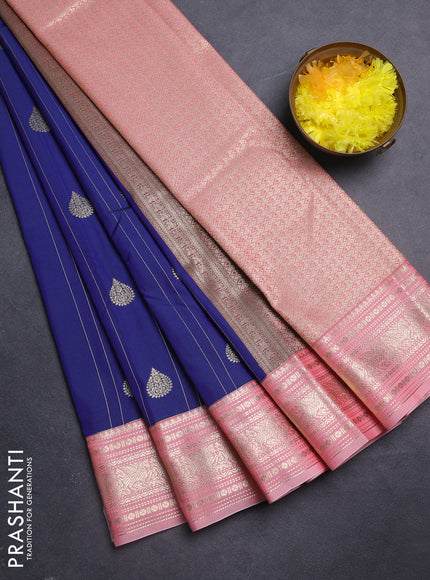 Semi kanchipuram silk saree blue and peach pink with allover zari weaves & buttas and zari woven korvai border