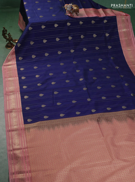 Semi kanchipuram silk saree blue and peach pink with allover zari weaves & buttas and zari woven korvai border