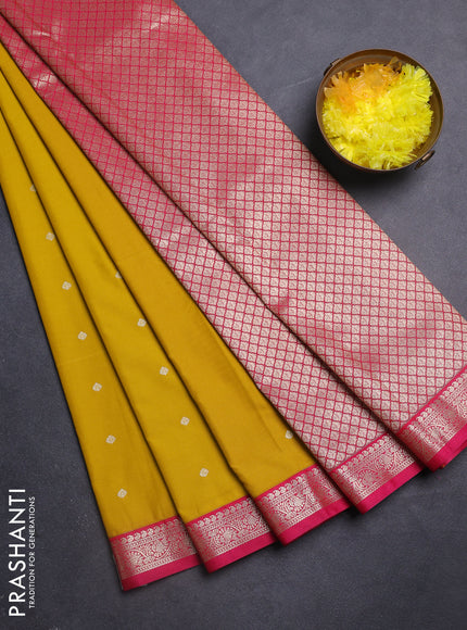 Semi kanchipuram silk saree mango yellow and pink with allover zari woven buttas and zari woven korvai border