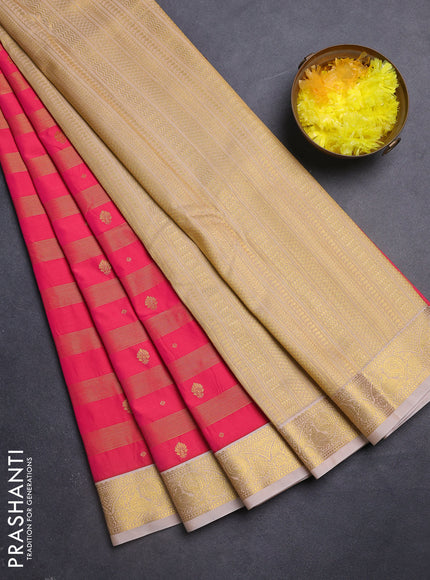 Semi kanchipuram silk saree pink and sandal with allover zari weaves & buttas and zari woven korvai border