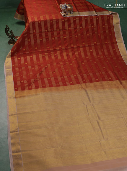 Semi kanchipuram silk saree rust shade and sandal with allover zari weaves & buttas and zari woven korvai border