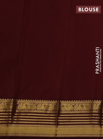 Semi kanchipuram silk saree teal green shade and deep maroon with allover zari woven buttas and zari woven korvai border