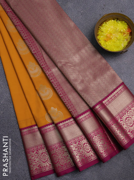 Semi kanchipuram silk saree mango yellow and purple with zari woven buttas and zari woven korvai border