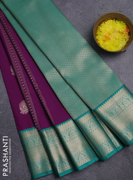 Semi kanchipuram silk saree purple and teal green with allover zari weaves & buttas and zari woven korvai border