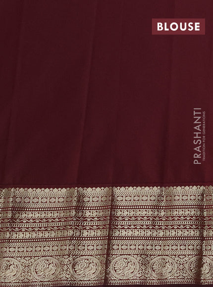 Semi kanchipuram silk saree dark mustard and deep maroon with zari woven buttas and long zari woven korvai border
