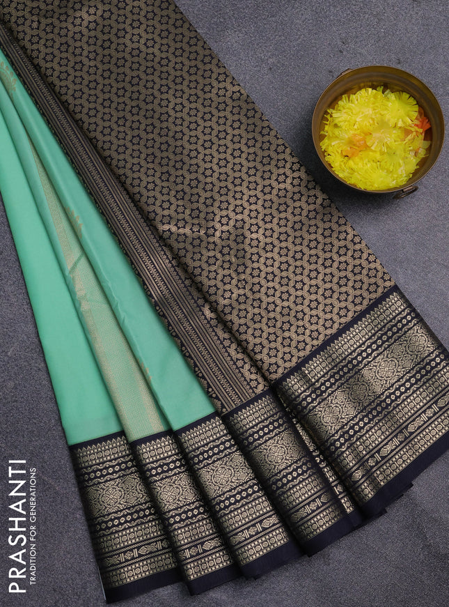 Semi kanchipuram silk saree teal green and navy blue with allover zari weaves & buttas and zari woven korvai border