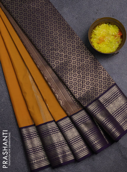 Semi kanchipuram silk saree mustard yellow and purple with zari woven buttas and zari woven korvai border