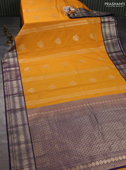 Semi kanchipuram silk saree mustard yellow and purple with zari woven buttas and zari woven korvai border