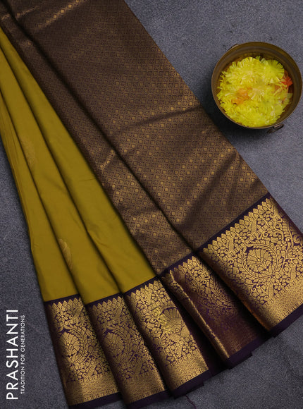 Semi kanchipuram silk saree mustard yellow and purple with zari woven buttas and zari woven korvai border