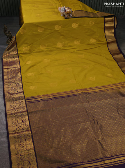 Semi kanchipuram silk saree mustard yellow and purple with zari woven buttas and zari woven korvai border