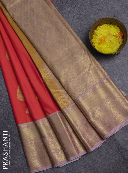 Semi kanchipuram silk saree dual shade of pinkish yellow and pastel pink with zari woven buttas and zari woven korvai border