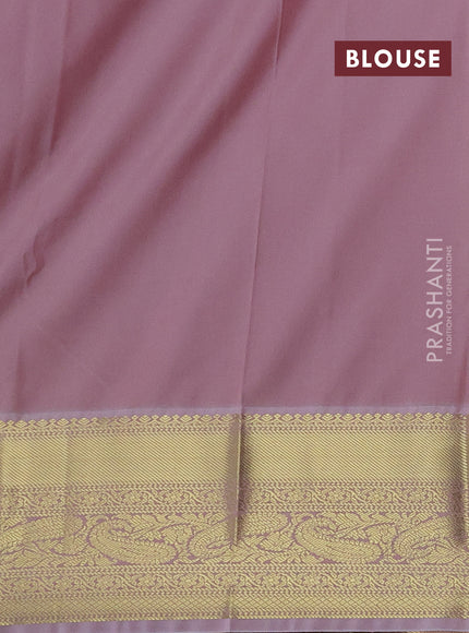 Semi kanchipuram silk saree dual shade of pinkish yellow and pastel pink with zari woven buttas and zari woven korvai border