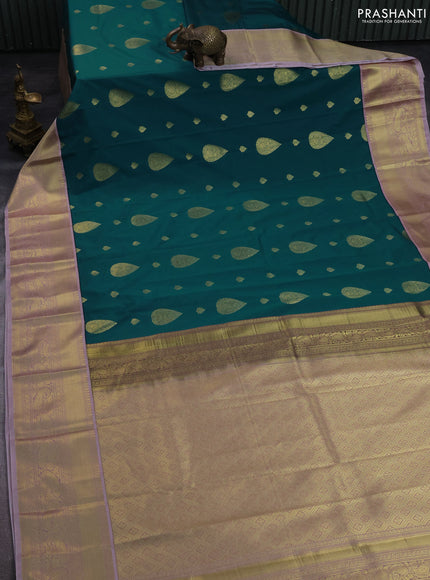 Semi kanchipuram silk saree peacock green and pastel pink with zari woven buttas and zari woven korvai border