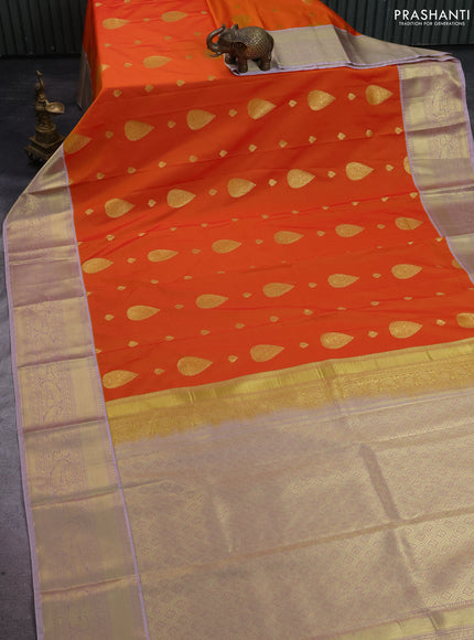 Semi kanchipuram silk saree dual shade of orange and pastel pink with zari woven buttas and zari woven korvai border