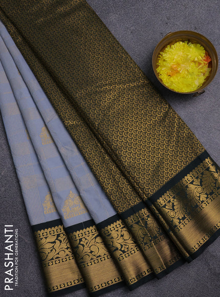 Semi kanchipuram silk saree grey and bottle green with allover zari checks & buttas and zari woven korvai border