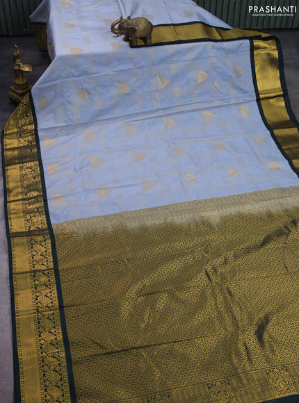 Semi kanchipuram silk saree grey and bottle green with allover zari checks & buttas and zari woven korvai border