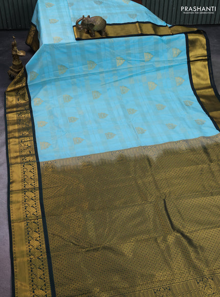 Semi kanchipuram silk saree teal blue and bottle green with allover zari checks & buttas and zari woven korvai border