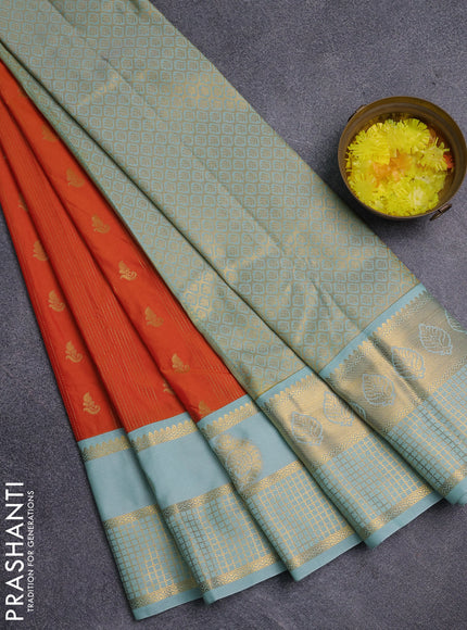 Semi kanchipuram silk saree sunset orange and mild teal blue with allover zari weaves & buttas and zari woven korvai border