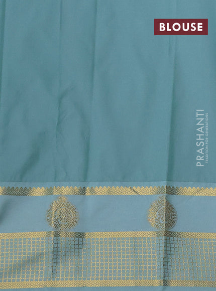 Semi kanchipuram silk saree sunset orange and mild teal blue with allover zari weaves & buttas and zari woven korvai border