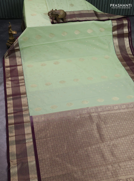 Semi kanchipuram silk saree pista green and wine shade with allover zari weaves & buttas and zari woven border