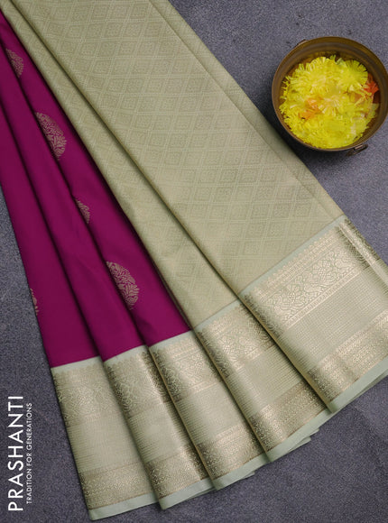 Semi kanchipuram silk saree purple and mild pista green with zari woven buttas and zari woven korvai border