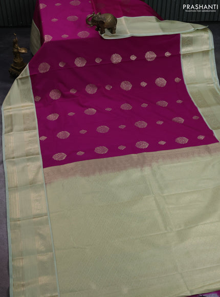 Semi kanchipuram silk saree purple and mild pista green with zari woven buttas and zari woven korvai border