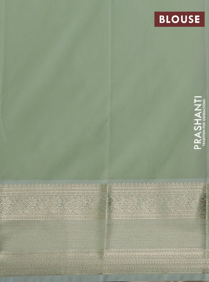 Semi kanchipuram silk saree purple and mild pista green with zari woven buttas and zari woven korvai border