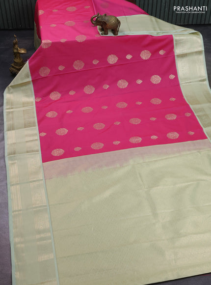 Semi kanchipuram silk saree pink and mild pista green with zari woven buttas and rich zari woven border