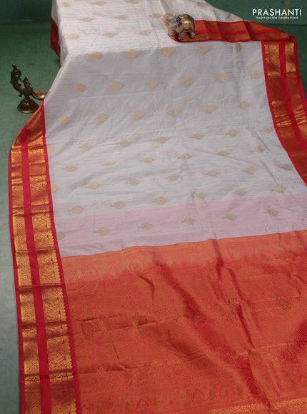 Semi kanchipuram silk saree off white and red with allover zari weaves & buttas and rettapet zari woven korvai border