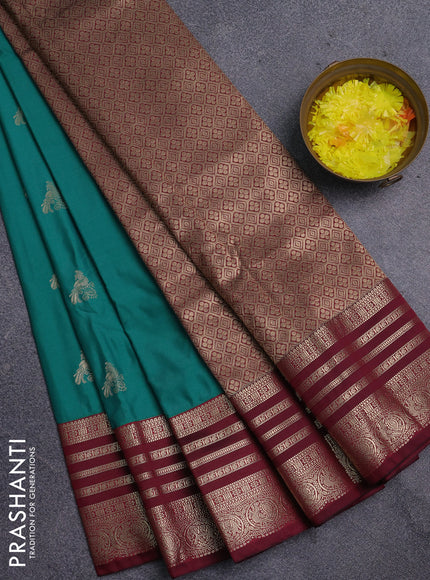 Semi kanchipuram silk saree teal green and wine shade with zari woven buttas and zari woven korvai border