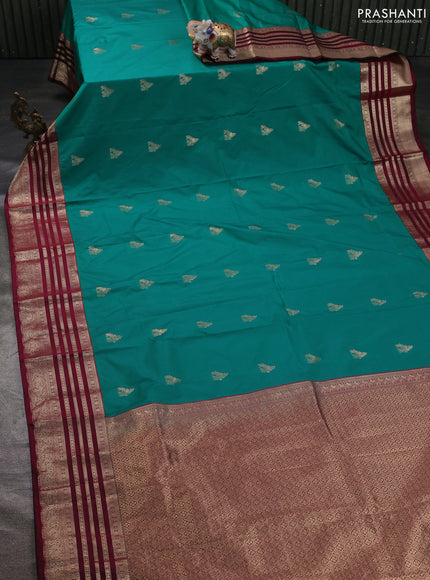Semi kanchipuram silk saree teal green and wine shade with zari woven buttas and zari woven korvai border