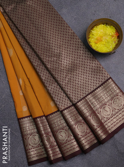 Semi kanchipuram silk saree mustard yellow and deep maroon with zari woven buttas and zari woven korvai border