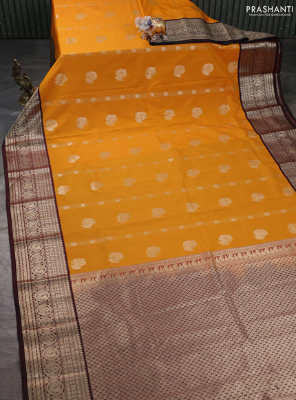 Semi kanchipuram silk saree mustard yellow and deep maroon with zari woven buttas and zari woven korvai border